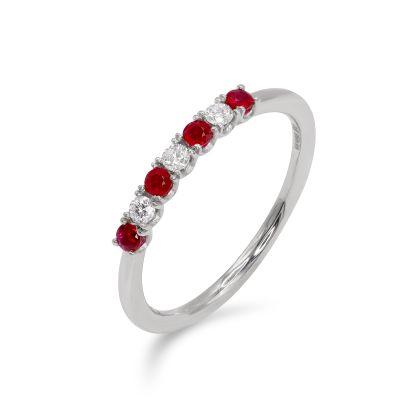 Lumbers Plat Ruby and diamond U claw set R0.24 D 0.10cts